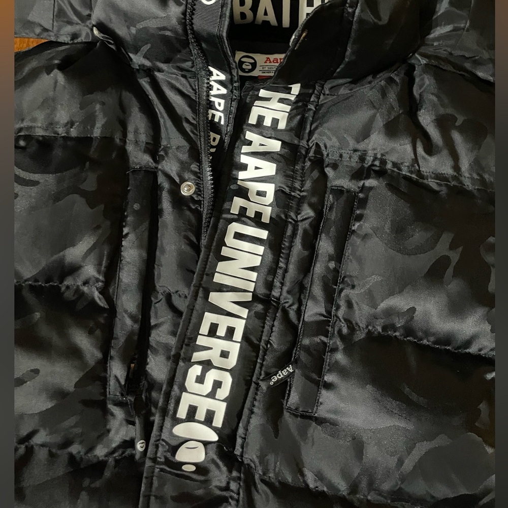 Black Puffer Jacket with Quilted Design and Full-Zip Closure